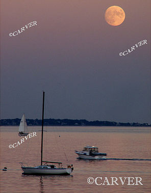 Cruising in Colors
Twilight colors reflecting from the calm waters of Beverly Harbor 
while a near full moon looms overhead.
Keywords: Beverly; moonrise; beach; ocean; photograph; picture; print