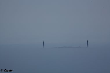 Up and Out of the Fog
The twin lighthouses on Thachers Island are the only sights above a summer afternoon fog stretching north from Gloucester to Rockport. 
