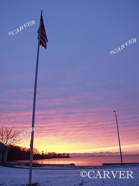 Winter Sunrise
A wide angle lens distorts the view here at Dane St. Beach in Beverly, MA.
Keywords: Beverly; sunrise; beach; ocean; flag; photograph; picture; print